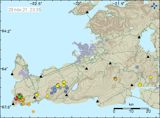 Earthquake swarm at the edge of Reykjanes peninsula shown by group of orange dots and a green star that is showing the earthquake activity.