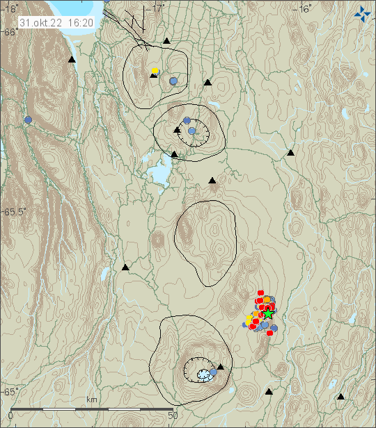 Green star and red dots around Herðubreið mountain. Showing strong earthquake activity in that area. 