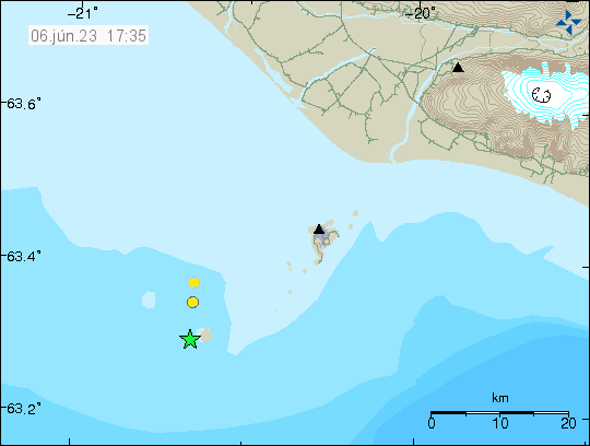 Green star next to Surtsey island, that is located south-west of Vestmanneyjar islands. A yellow dot showing a smaller earthquake north of the green star. Second yellow dot is an ghost earthquake.