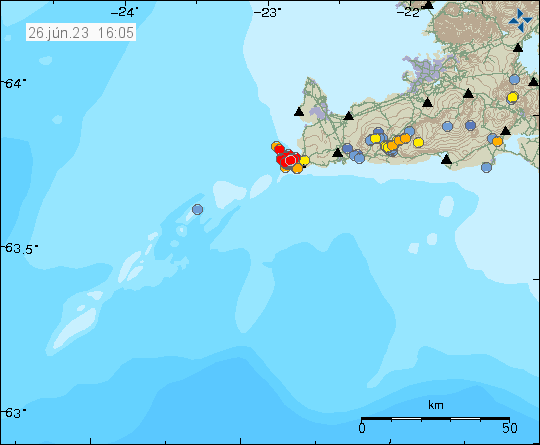 Earthquake swarm out in the ocean close to Reykjanestá in the Reykjanes volcano. A lot of red dots piled on top of each other. Blue to orange dots located elsewhere on the Reykjanes peninsula. Time on map 26. June. 23. 16:05 (Icelandic Time).