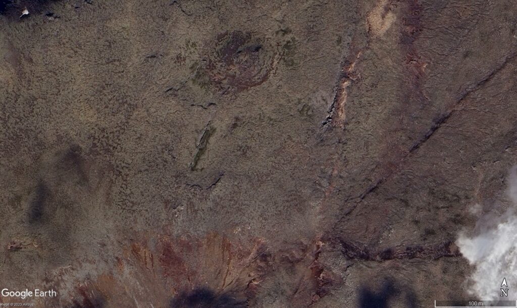 A crack in the ground on satellite image from Google Earth in Fagradalsfjall volcano.