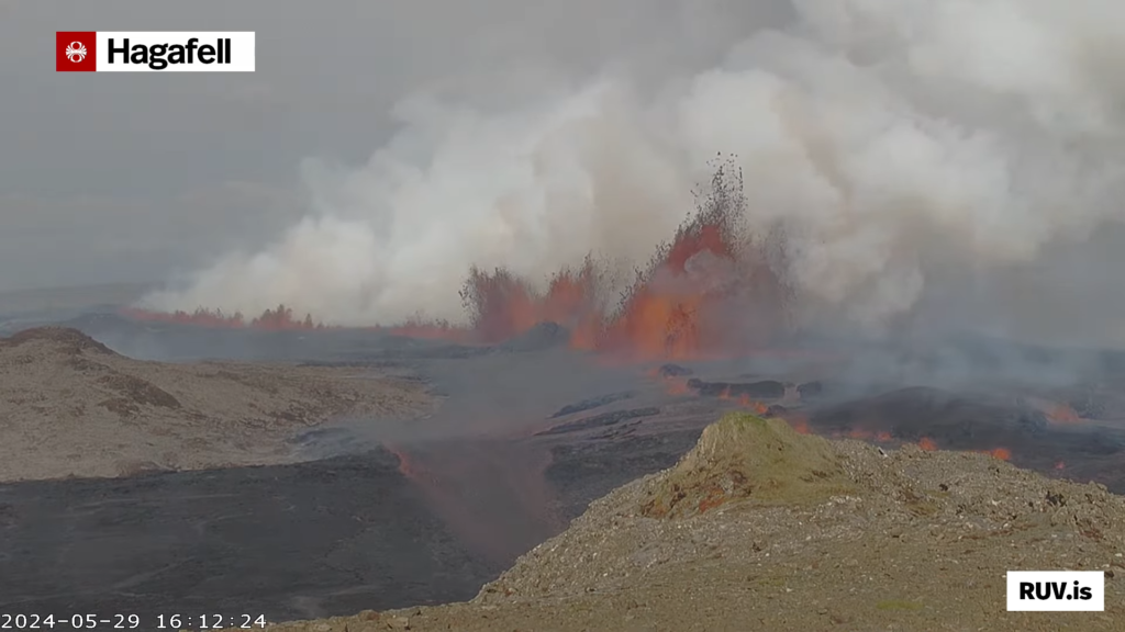 The eruption as it was at 16:12:24 UTC and reaching peak of its activity. I am not sure what the peak is on this image, but based on the lava flow that is going over a small hill. It was high and a strong lava flow was happening.